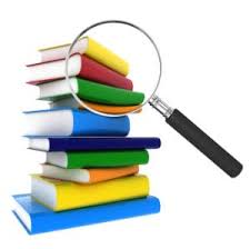 Books with magnifying glass 
